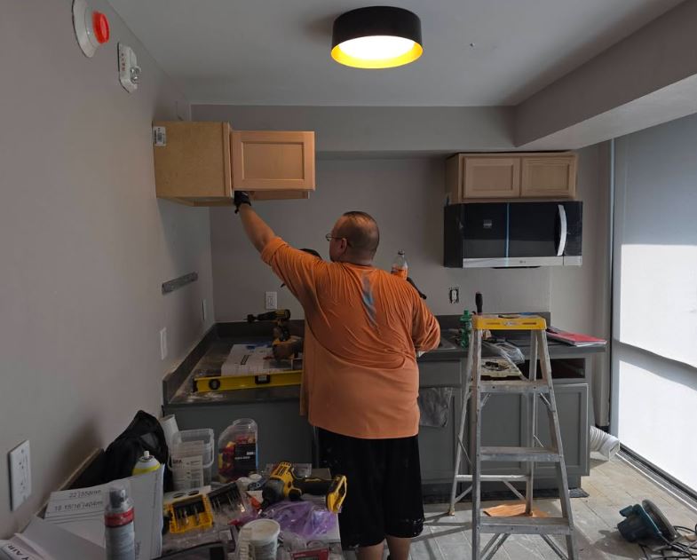 Cabinet installation in progress by Joe's crew